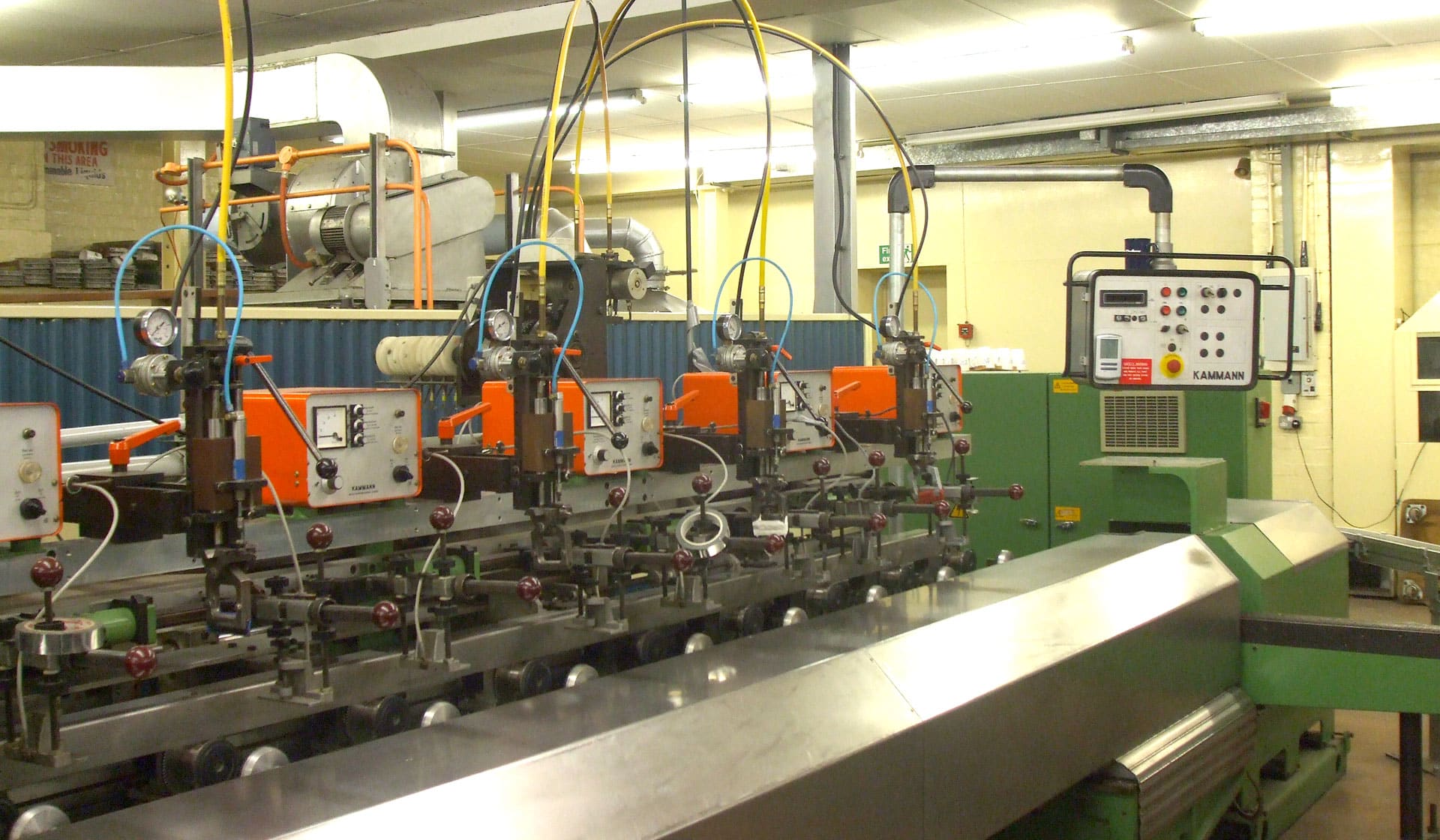 Mug screen printing machine at Prince William Pottery