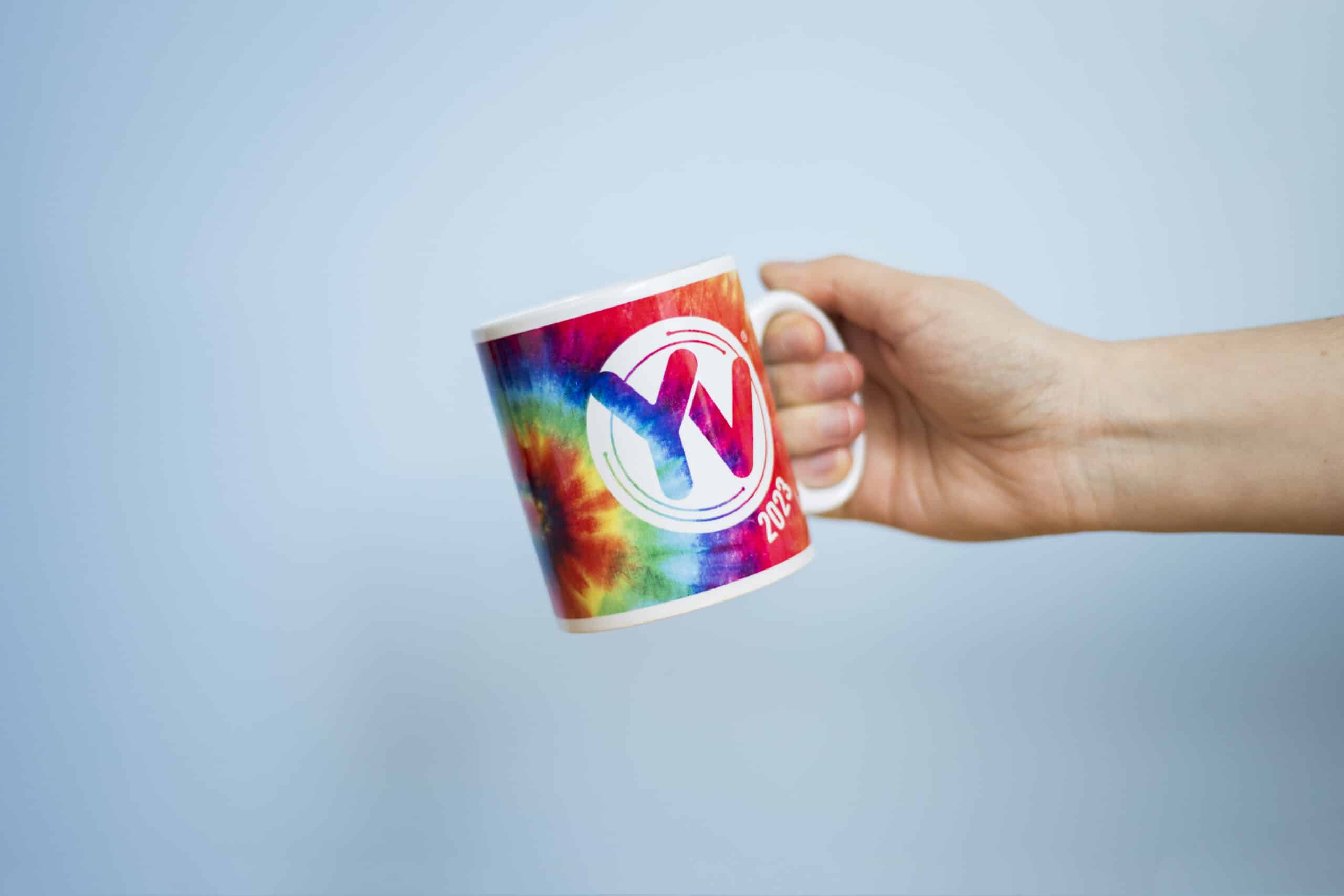 promotional mug being held