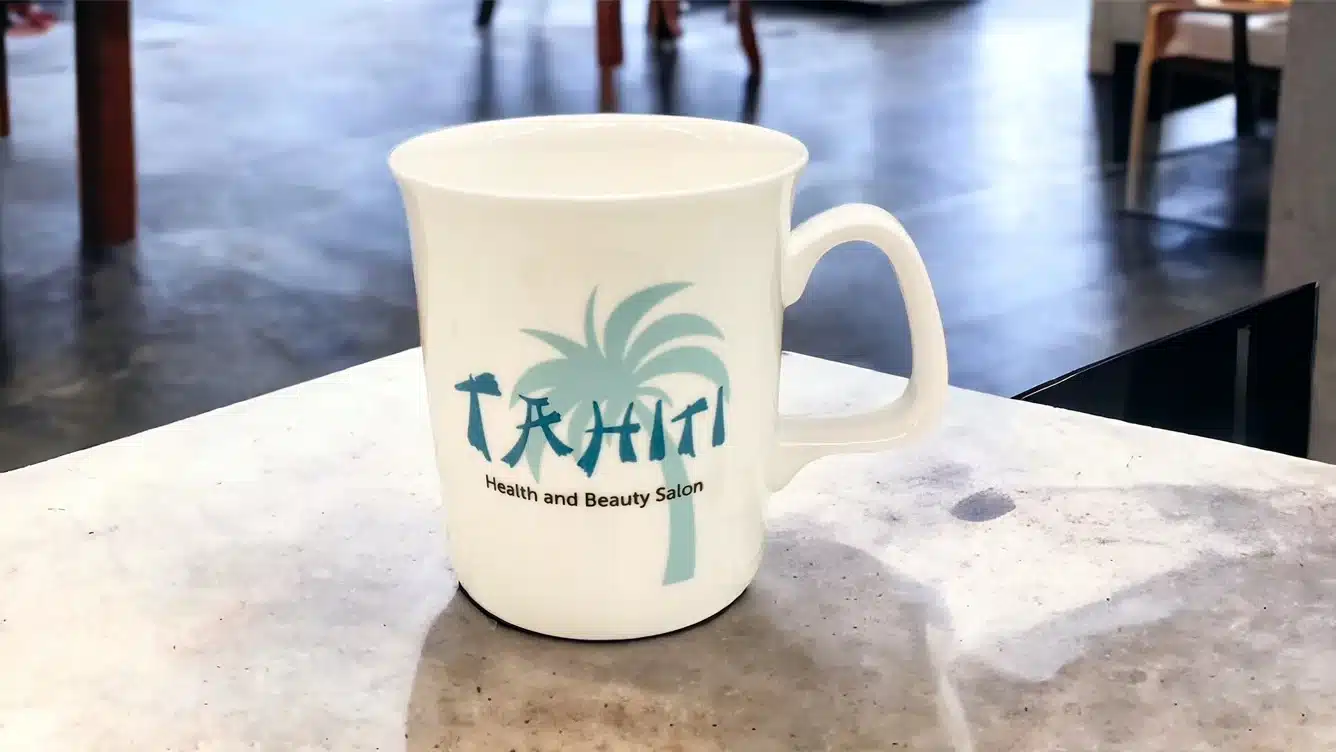 branded mug on concrete counter top