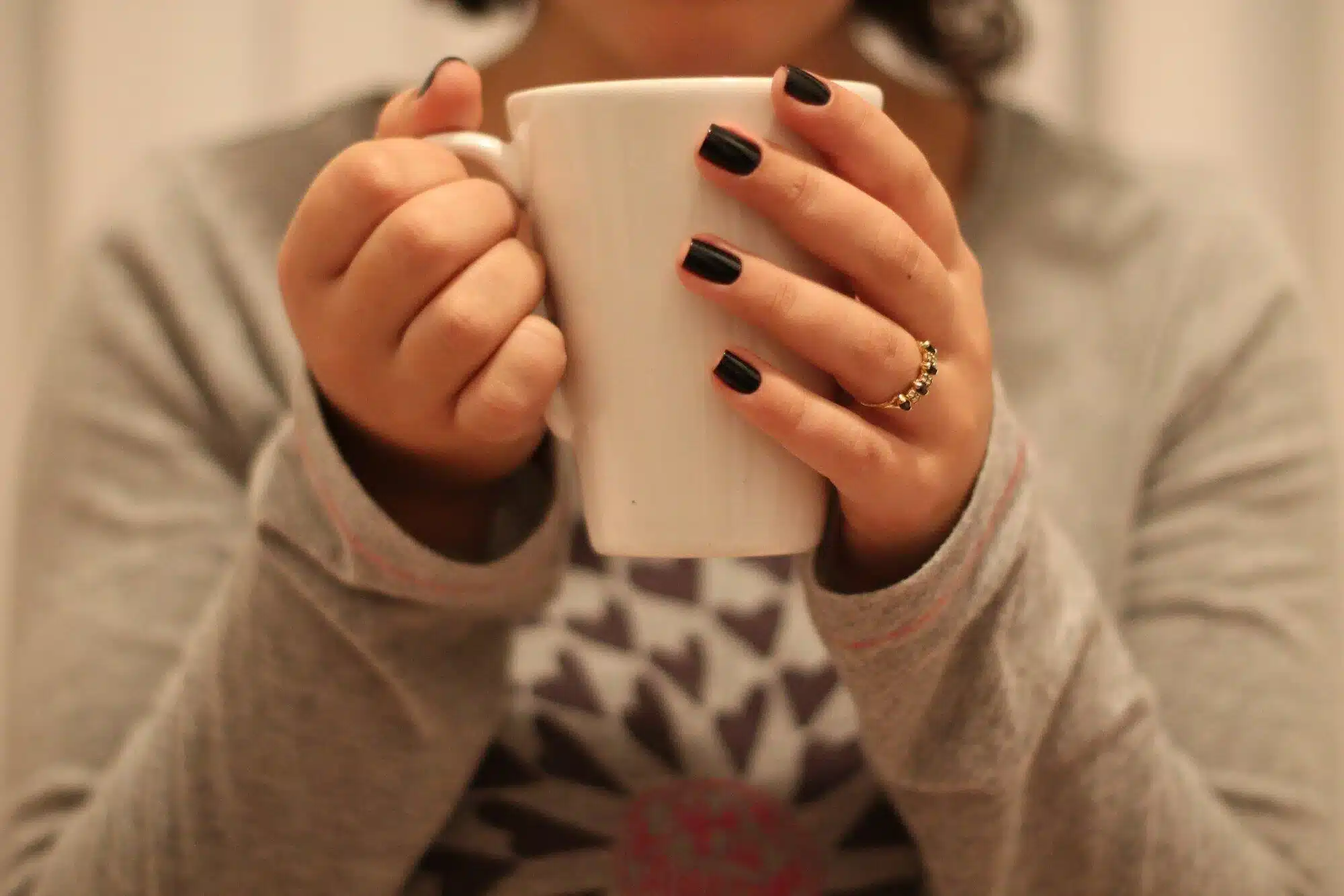 woman holding a mug