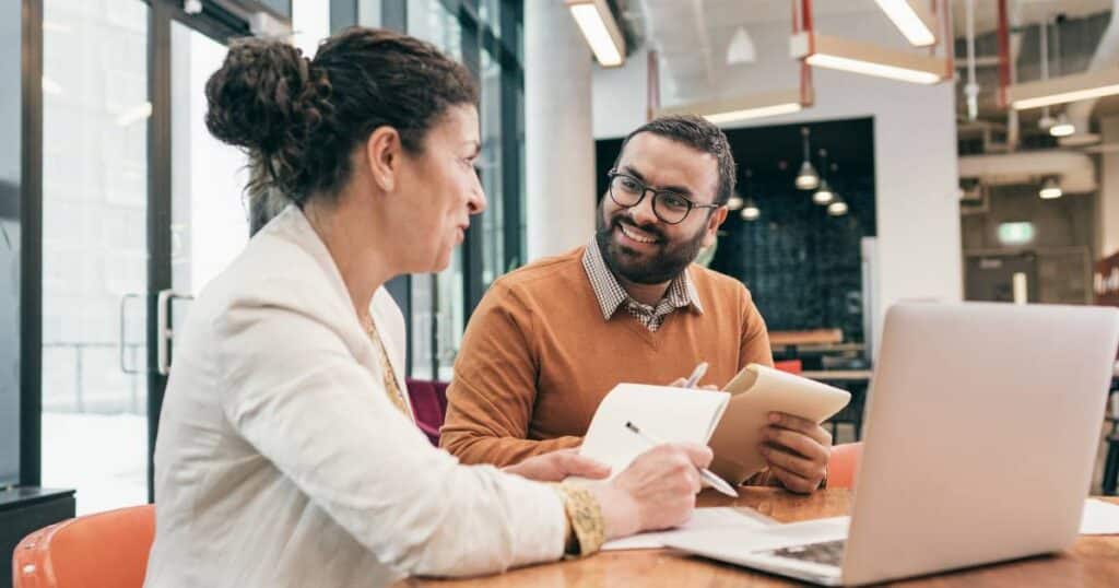 business owner providing a gift to employee on employee appreciation day